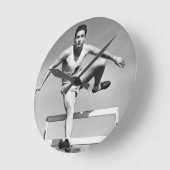 Man Hurdling Ronde Klok (Hoek)