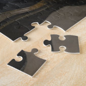 Man leest legpuzzel (Zijkant)