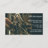 Man maakt aanpassingen op fietswiel visitekaartje (Voorkant)