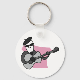 Man met baret die akoestische gitaar speelt sleutelhanger