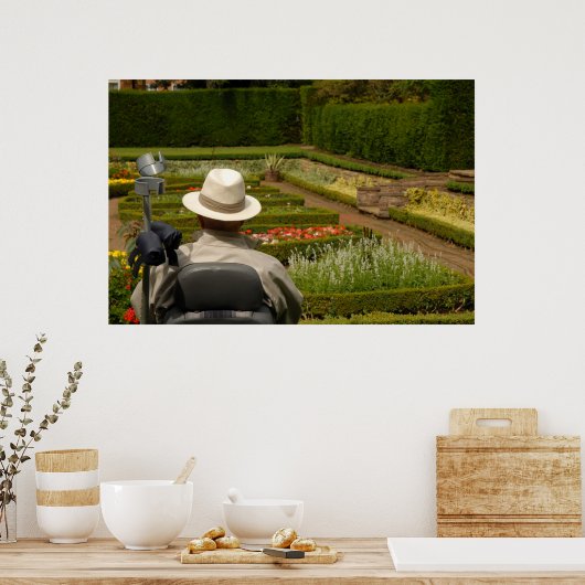 Man met een handicap in rolstoel in de tuin poster (Keuken)