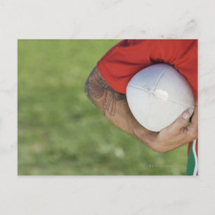 Man met rugbykogel briefkaart