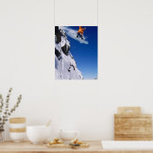 Man op een snowboard die van een kraanhuis springt poster (Keuken)