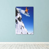 Man op een snowboard springend van een richel bij canvas afdruk (Insitu (Houten vloer))