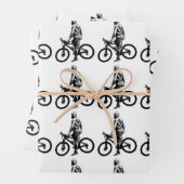 Man op fiets grafisch motiefpatroon inpakpapier vel (In situ)