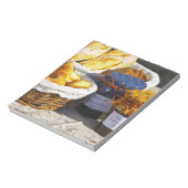 mandje met croissants en chocoladebrood. notitieblok (Linkerzijde)