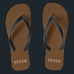 Mannelijke Groom Teenslippers Custom kleuren<br><div class="desc">"bruin" met beige "bruidegom" bewerkbare tekst. Geweldig voor iedereen op het huwelijksfeest of zet gewoon jouw naam in de sjabloon. Klik op "Aanpassen" en gebruik de stalen aan de rechterkant om de achtergrondkleur te wijzigen. Het pipet-gereedschap geeft u nog meer stalen en de "geavanceerde" link opent het hele spectrum. U...</div>