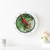 Mannelijke Noordelijke Kardinaal en Holly Grote Klok (Huis)