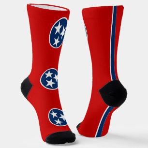 Mannen bemannen sokken met vlag van Tennessee
