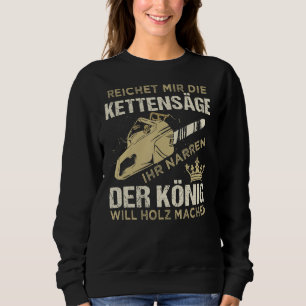 Mannen bereikt me de kettingzaag haar dwazen, hout trui