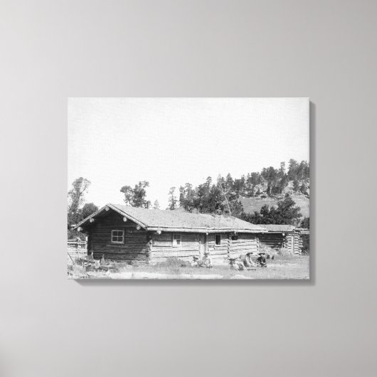 Mannen buiten Log Cabin in South Dakota Canvas Afdruk (Voorkant)