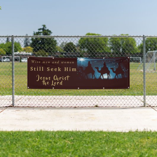 Mannen met kerstbanners en vrouwen die hem zoeken spandoek (Insitu)