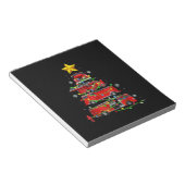 Mannen met kerstbomen voor brandweerlieden notitieblok (Schuin)