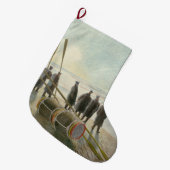 Mannen op het strand (gevaarlijk werk bij lage tem grote kerstsok (Voorkant (Hangend))