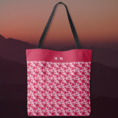 Maple lekt op een roze achtergrond tote bag