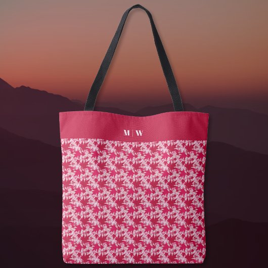 Maple lekt op een roze achtergrond tote bag