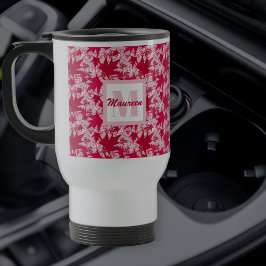 Maple lekt op een roze achtergrondse reismuis reisbeker