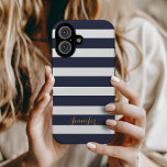 Marine Blauw en Goud Klassieke Strepen Monogram iPhone 16 Hoesje<br><div class="desc">Bescherm uw telefoon in stijl met deze klassieke preppy gestreepte iPhone-hoes, met een tijdloos streeppatroon en een gepersonaliseerde naam of monogram voor een verfijnde touch. Kies uit een verscheidenheid aan kleuren en lettertypen die passen bij uw esthetiek, of u nu de voorkeur geeft aan gedurfde, pastelkleurige of neutrale tinten. Ontworpen...</div>