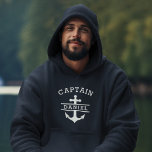 Marineblauw Kapitein Boot Nautisch Ankerschip Hoodie<br><div class="desc">Vaar in stijl met de Navy Blue Captain Boat Nautical Anchor Ship Hoodie. Dit premium t-shirt heeft een klassieke marineblauwe tint en een opvallend anker- en scheepsontwerp, ideaal voor maritieme liefhebbers. Gemaakt van zachte, ademende stof, zorgt het voor de hele dag comfort, of je nu op het water of op...</div>