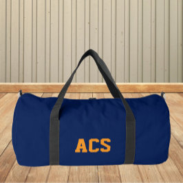 Marineblauwe en oranje schoolkleuren en letters plunjezak