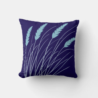 marineblauwe kussen met strandgras