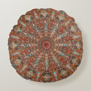 Marokkaans mandala patroon in terracotta tones rond kussen