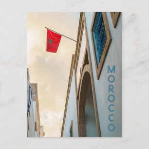 Marokkaanse architectuur met vlag, reisfoto briefkaart