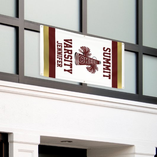 Maroon- en goudkleurige verticale banner (Buitenkant Gebouw)