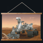 Mars Science Laboratory Curiosity Rover. 4 Hangend Wandkleed<br><div class="desc">Cadeau Artistiek concept van Mars Science Laboratory Curiosity rover, een mobiele robot voor het onderzoeken van Mars' vermogen om microbieel leven op peil te houden. In dit afbeelding onderzoekt de rover een rots op Mars met een set gereedschappen aan het uiteinde van de arm van de rover, die ongeveer 7...</div>