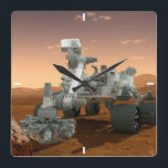 Mars Science Laboratory Curiosity Rover. 4 Vierkante Klok<br><div class="desc">Cadeau Artistiek concept van Mars Science Laboratory Curiosity rover, een mobiele robot voor het onderzoeken van Mars' vermogen om microbieel leven op peil te houden. In dit afbeelding onderzoekt de rover een rots op Mars met een set gereedschappen aan het uiteinde van de arm van de rover, die ongeveer 7...</div>