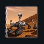 Mars Science Laboratory Curiosity Rover. Notitieboek<br><div class="desc">Het concept van Mars Science Laboratory Curiosity rover is een mobiele robot die het cadeau van Mars onderzoekt. In dit afbeelding onderzoekt de rover een rots op Mars met een set gereedschappen aan het uiteinde van de arm van de rover, die ongeveer 7 voet uitstrekt. Twee instrumenten op de arm...</div>