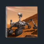 Mars Science Laboratory Curiosity Rover. Notitieboek<br><div class="desc">Het concept van Mars Science Laboratory Curiosity rover is een mobiele robot die het cadeau van Mars onderzoekt. In dit afbeelding onderzoekt de rover een rots op Mars met een set gereedschappen aan het uiteinde van de arm van de rover, die ongeveer 7 voet uitstrekt. Twee instrumenten op de arm...</div>