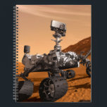 Mars Science Laboratory Curiosity Rover. Notitieboek<br><div class="desc">Het concept van Mars Science Laboratory Curiosity rover is een mobiele robot die het cadeau van Mars onderzoekt. In dit afbeelding onderzoekt de rover een rots op Mars met een set gereedschappen aan het uiteinde van de arm van de rover, die ongeveer 7 voet uitstrekt. Twee instrumenten op de arm...</div>