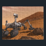 Mars Science Laboratory Curiosity Rover. Puzzel<br><div class="desc">Het concept van Mars Science Laboratory Curiosity rover is een mobiele robot die het cadeau van Mars onderzoekt. In dit afbeelding onderzoekt de rover een rots op Mars met een set gereedschappen aan het uiteinde van de arm van de rover, die ongeveer 7 voet uitstrekt. Twee instrumenten op de arm...</div>