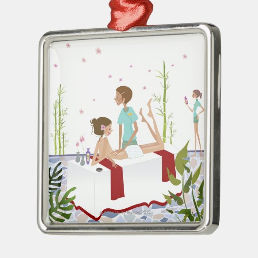 Massagetherapeut masseert een vrouw die op een metalen ornament (Links)