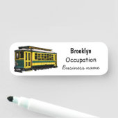 Mata trolley cartoon illustratie naamplaatje (In situ)