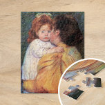Maternal Kiss | Mary Cassatt Jigzaag Puzzle Legpuzzel<br><div class="desc">Maternal Kiss (1896) van Mary Cassatt is een ontroerend portret van een teder moment tussen een moeder en kind. Het schilderij legt de intieme band vast terwijl de moeder haar kind zachtjes kust, beide figuren weergegeven met zachte, delicate penseelstreken. Cassatt's gebruik van warme kleuren en haar aandacht voor detail benadrukken...</div>