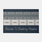 Matig bloemstuk in gedempte kleur deurmat (Voorkant)