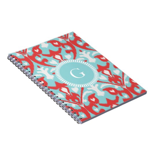 Matig monogram van het rode ikattribaal notitieboek (Rechterzijde)