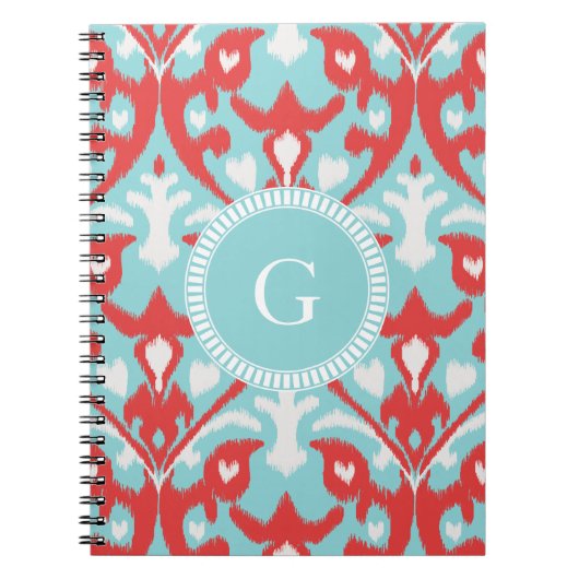 Matig monogram van het rode ikattribaal notitieboek (Voorkant)