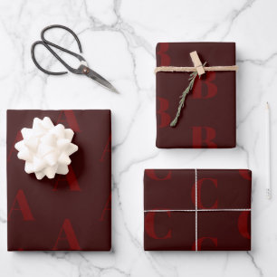 Matig patroon initiaal van monogram bordeaux inpakpapier vel
