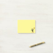 Matig schattige honingbij op geel post-it® notes (Op bureau)