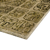 Maya- en aztec-glyphs goud op textuur snijplank (Hoek)