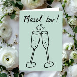 Mazel Tov Bruiloft Champagne Proost Schets Doodle Kaart<br><div class="desc">Zoete tekening van twee bubbelglazen om iemand te feliciteren met hun bruiloft of verloving! Klik op "Personaliseren" hierboven om de binnentekst naar wens te bewerken. Klik vervolgens op "Bewerken met behulp van ontwerpgereedschap" om de lettertypen, kleuren en plaatsingen aan te passen. U kunt ook de achtergrondkleur wijzigen of mijn winkel...</div>