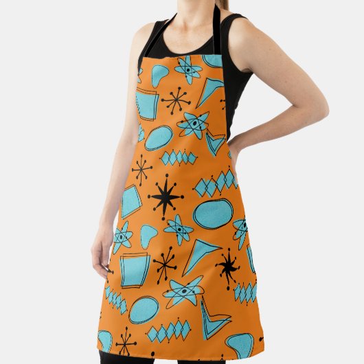 MCM Atomic Shapes Turquoise op Sinaasappel Schort (Insitu)