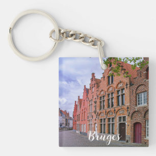 Medieval kleurrijke bakstenen in Brugge, België Sleutelhanger