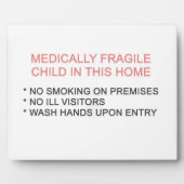 Medisch kwetsbare kinderen in een huiselijk plaatj fotoplaat (Voorkant)