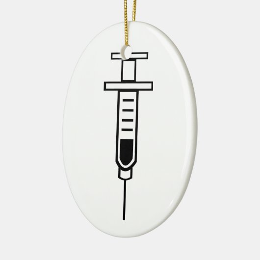 Medische spuit keramisch ornament (Links)