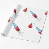 Medische spuit met bloeddruppel cadeaupapier (Uitgerold)