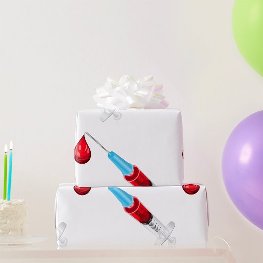 Medische spuit met bloeddruppel cadeaupapier